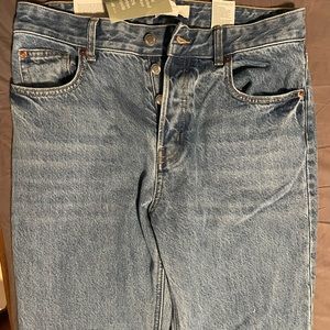 H&M never worn US 8 flare high waist (ankle length) jeans. With tag